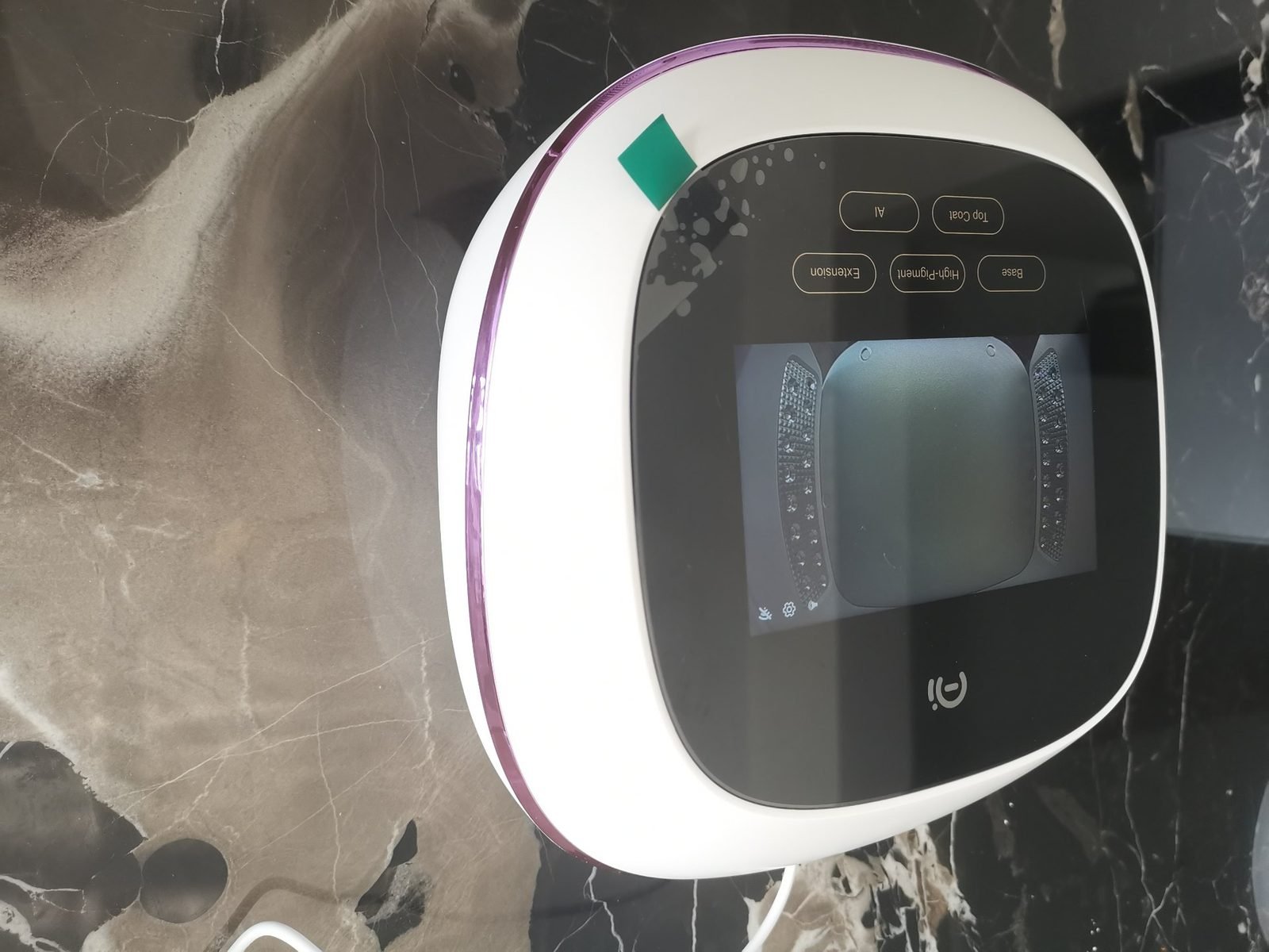 AI Smart Nail Lamp production sample with matte white shell and custom purple electroplated chrome trim ring