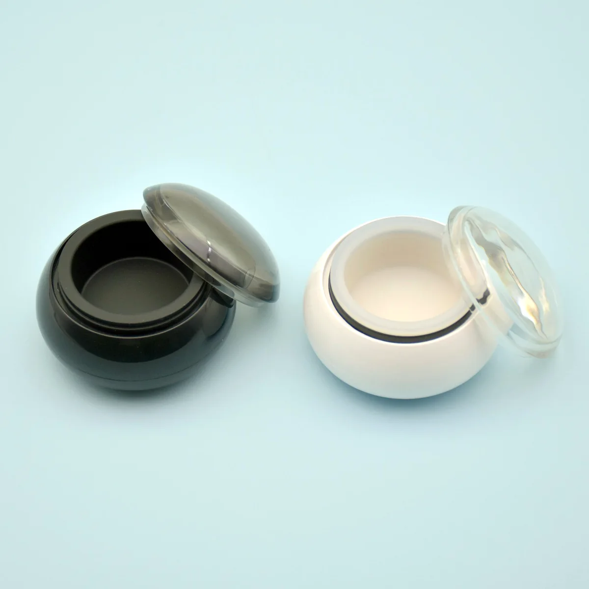 PW6 mini wax heater color options: gloss black and gloss white side by side