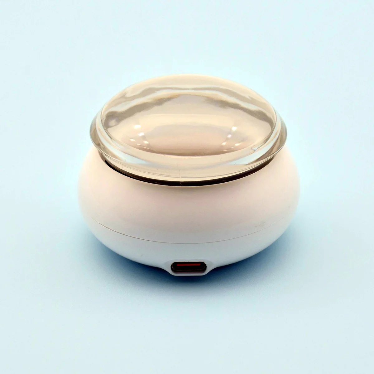 PW6 mini wax heater in gloss white, front view with see-through cover