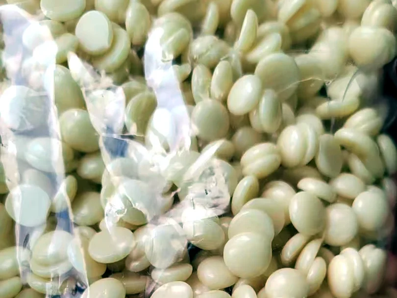 BeauTome Formula A2 premium rosin hard wax beans in cream white — real production shot