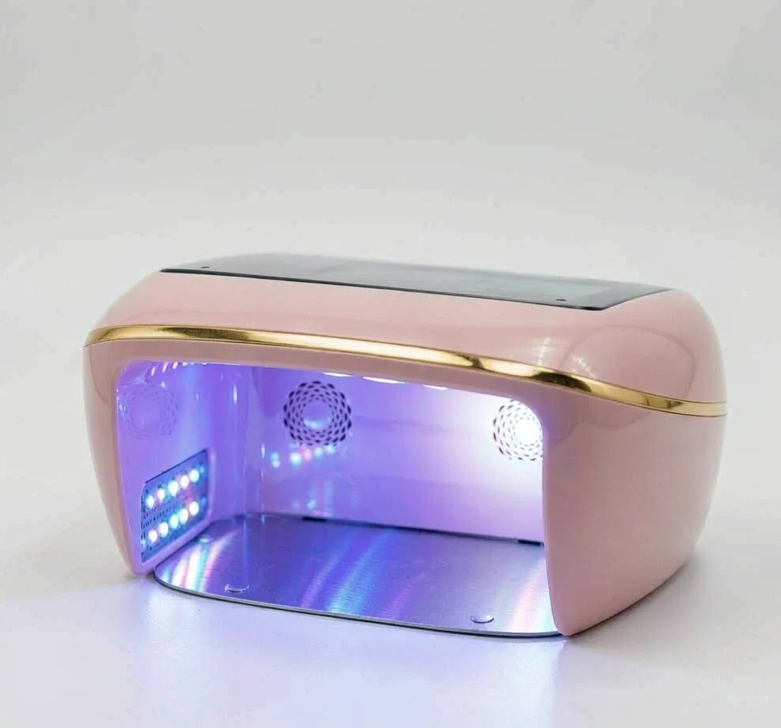 136 dual-wavelength LEDs glowing inside the BeauTome V2 curing chamber
